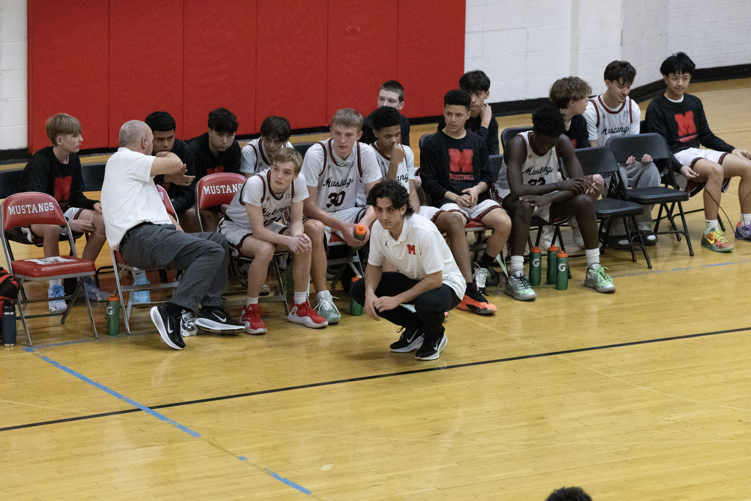 LakeShore Legends team and coaches on the bench